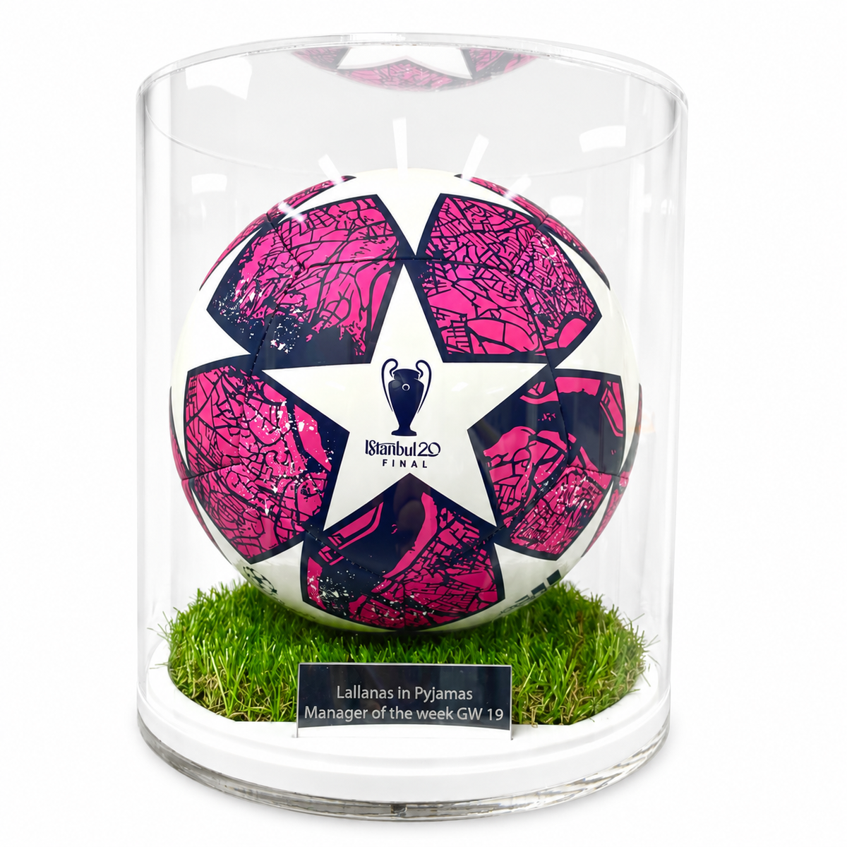 Cylindrical Football Display Case - Grass Effect Base, front view with inscription plaque on a white background